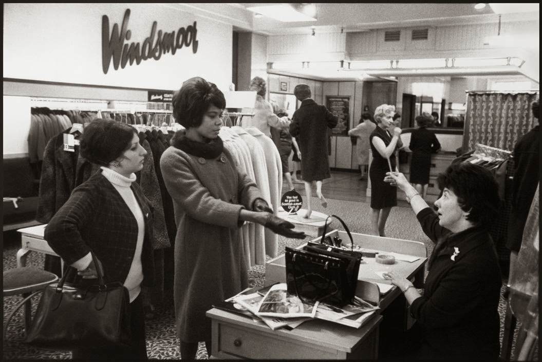 Black actress shops on Oxford Street, London.
