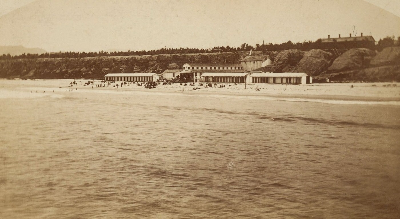 This is the Santa Monica Bathhouse, built in 1876. It included rooms for rent, enormous bathtubs, and two steam rooms. It was built by Colonel Baker and millionaire John Percival Jones, who developed much of Santa Monica.