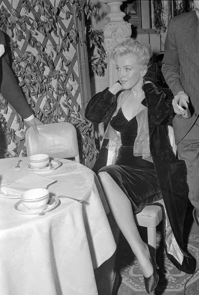 Behind the Glamour: Marilyn Monroe and Laurence Olivier at a 1956 Press Conference