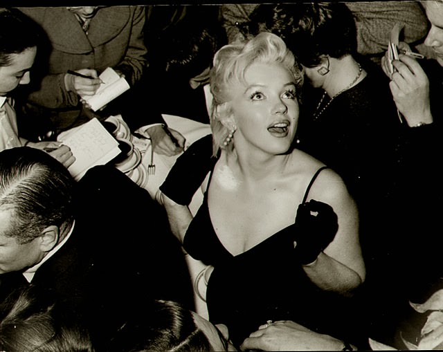 Behind the Glamour: Marilyn Monroe and Laurence Olivier at a 1956 Press Conference