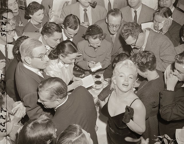 Behind the Glamour: Marilyn Monroe and Laurence Olivier at a 1956 Press Conference
