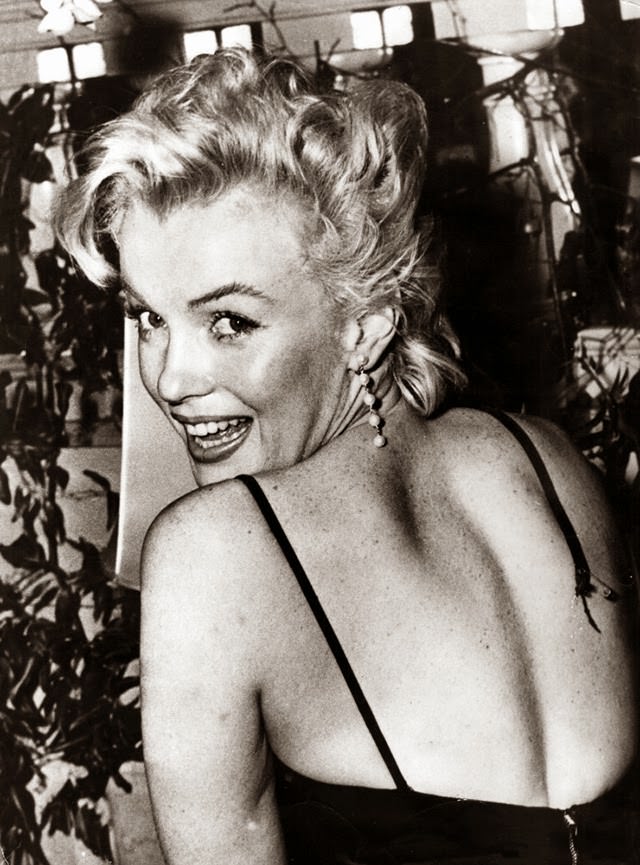 Behind the Glamour: Marilyn Monroe and Laurence Olivier at a 1956 Press Conference