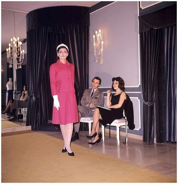 Natalie Wood with Italian fashion designer Patrick de Barentzen at a private showing of his collection, 1965.
