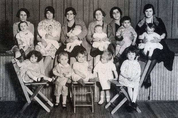 Six mothers and 11 children who benefitted from the family-assistance programs offered at the Settlement House in Madison.