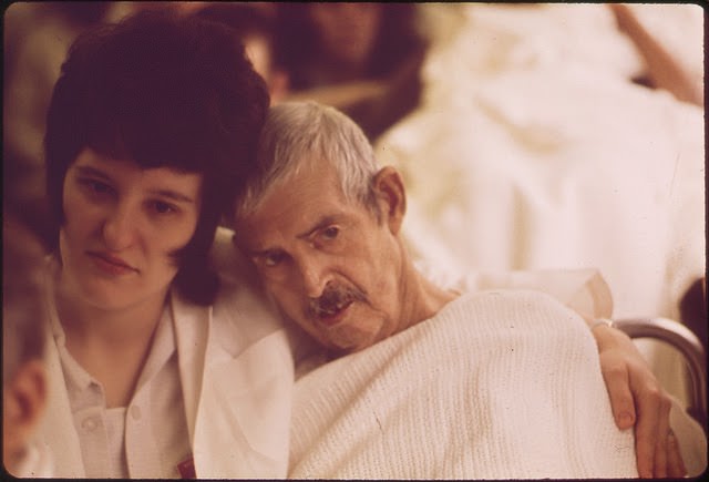 A Nurse Helps An Elderly Patient Leave Louisville Memorial Hospital, March 1972