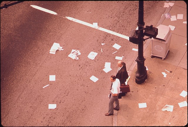 Magazines And Newspapers Litter The Intersection Of Sixth & Broadway After Debris Was Spilled From A Passing Truck, September 1972