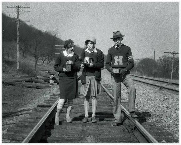 A trio of keen amateurs, perhaps doing a bit of train spotting, late 1920's.