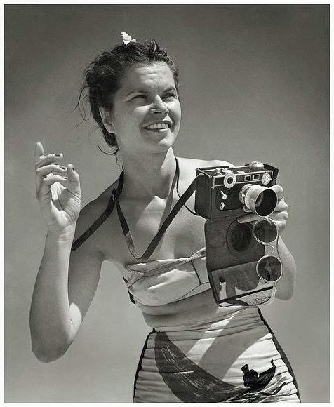 On R&R in the 1940's is a United States Women's Army Corps Photographer with an Argus (Brick) camera.