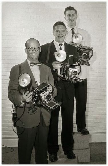 Photographers of the Ledger Enquirer in Columbus Georgia posing with their Graflex cameras, early 1960's