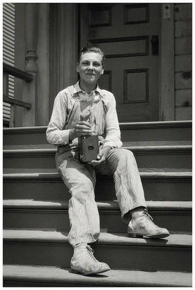A young fellow with a large Kodak box camera, probably posed during the early 1930's in America.