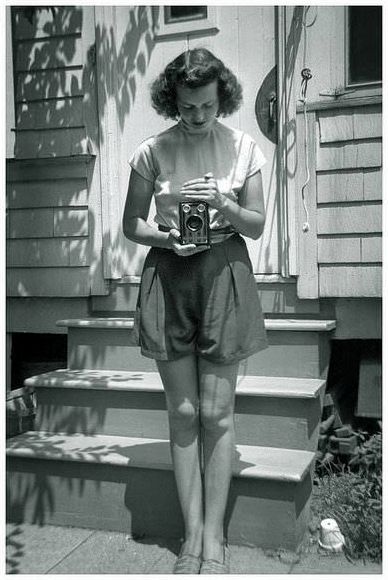 A correct way to hold and use a box camera. This time, a Kodak Six-16 Brownie Junior.