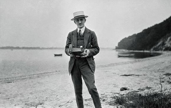This guy looks to be holding a No4 Folding Kodak Camera.