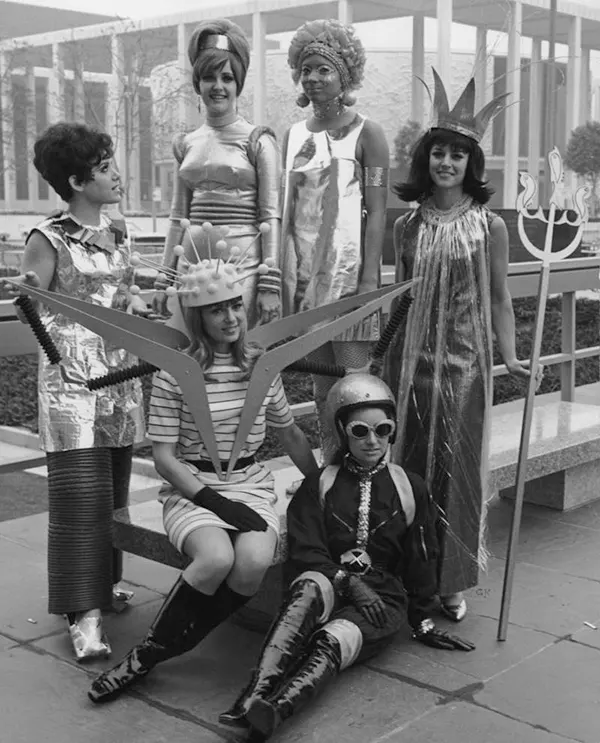 Women model futuristic fashion for the year 2000 during Engineering Week, circa 1965.