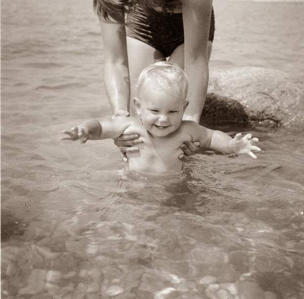 In this photo, circa 1955, little Cecelia Novel sure looks like she's enjoying her first swimming lesson in the ocean.
