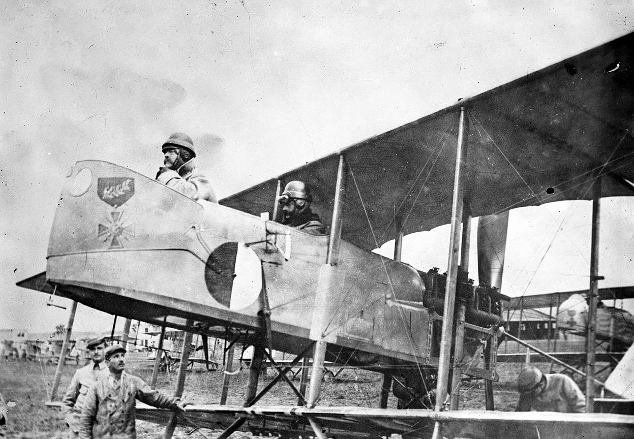 Captain Maurice Happe, commander of French squadron MF 29, seated in his Farman MF.11 Shorthorn bomber with a Captain Berthaut, 1915.