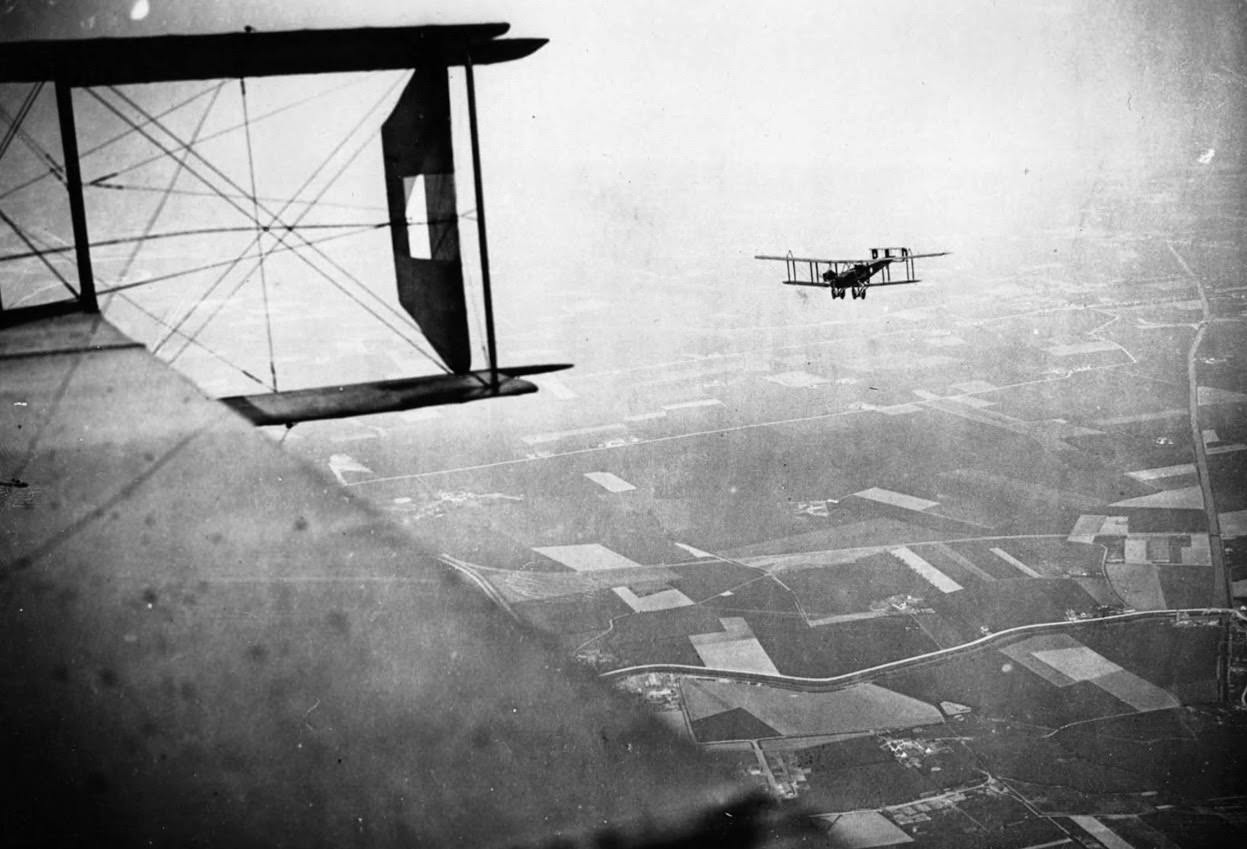 British Handley-Page bombers on a mission on the Western Front; this photograph shows another Handley-Page bomber setting out on a bombing mission, 1918.