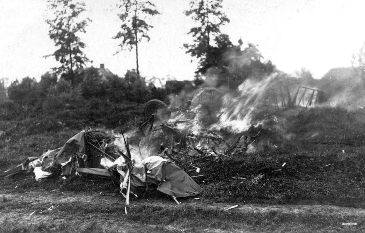 An aircraft crashed and burning in German territory, 1917.