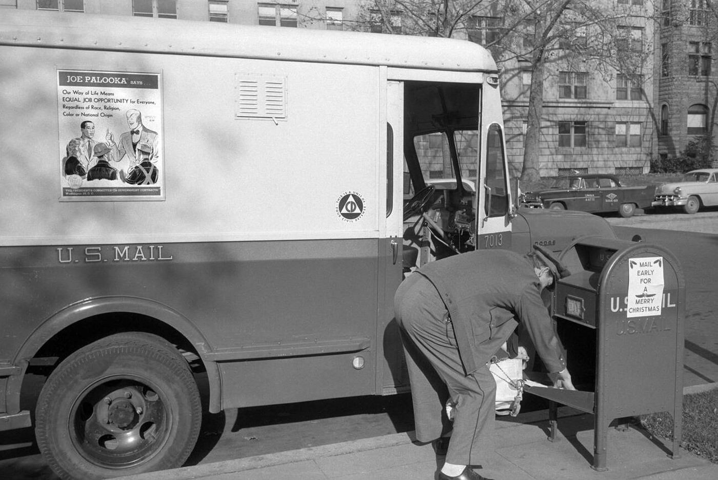 Mailman picking up Mail from Mailbox with a Job Opportunity Poster on the Side of the Mail Truck, Washington, D.C., 1957.