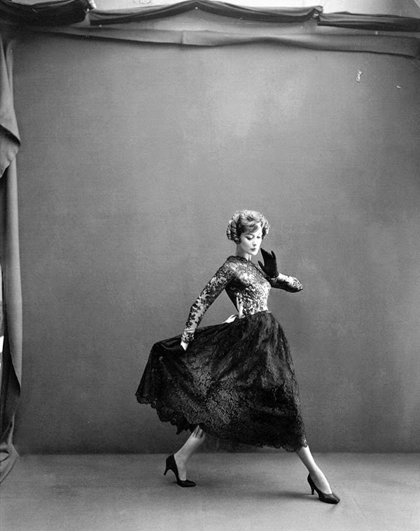 Wearing Lanvin-Castillo's floaty lace evening dress, 1956