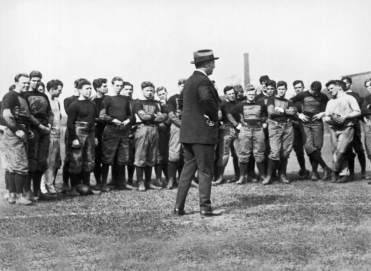 Head coach Bob Fisher addresses Harvard football candidates on the first day of spring practice, Boston, 1925