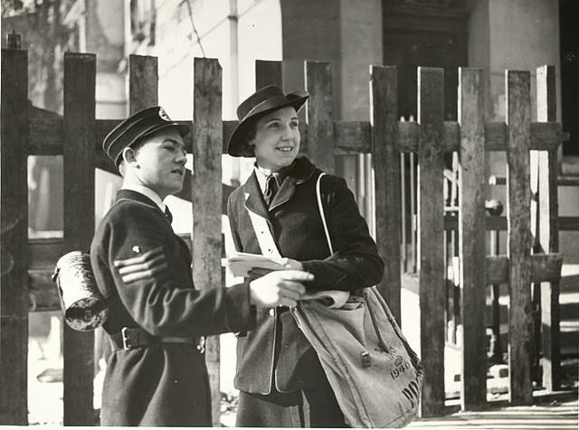 Postwoman and boy messenger