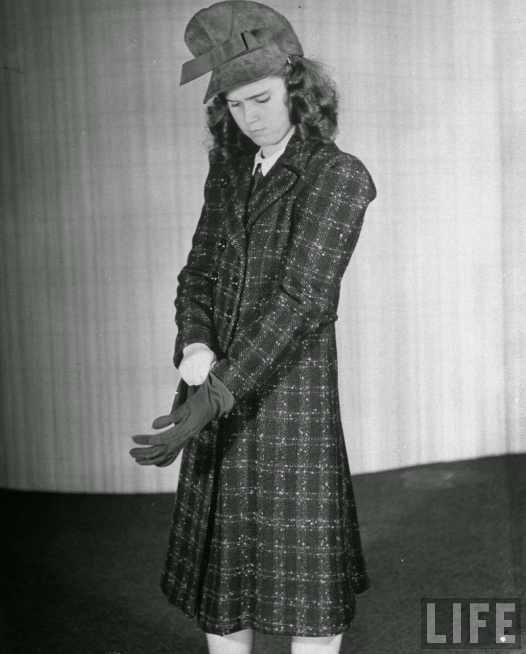 Plaid coat and suede hat with visor (poularized by Marlene Dietrich) for spring.
