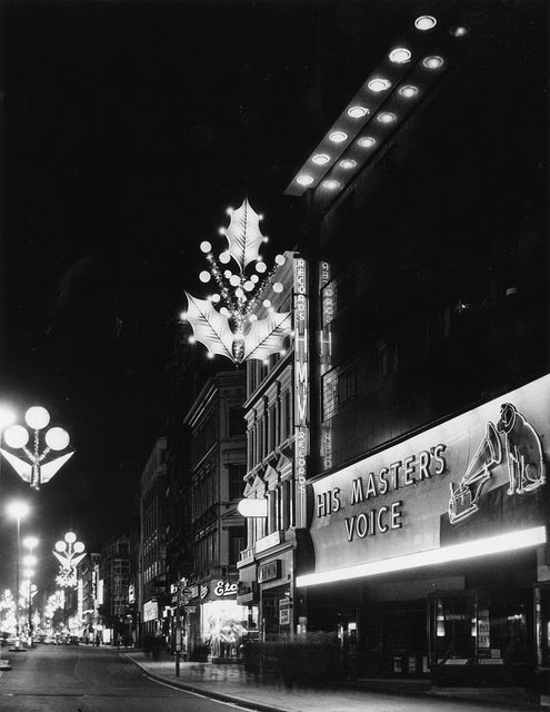 Exterior of store at Christmas time, 1950s