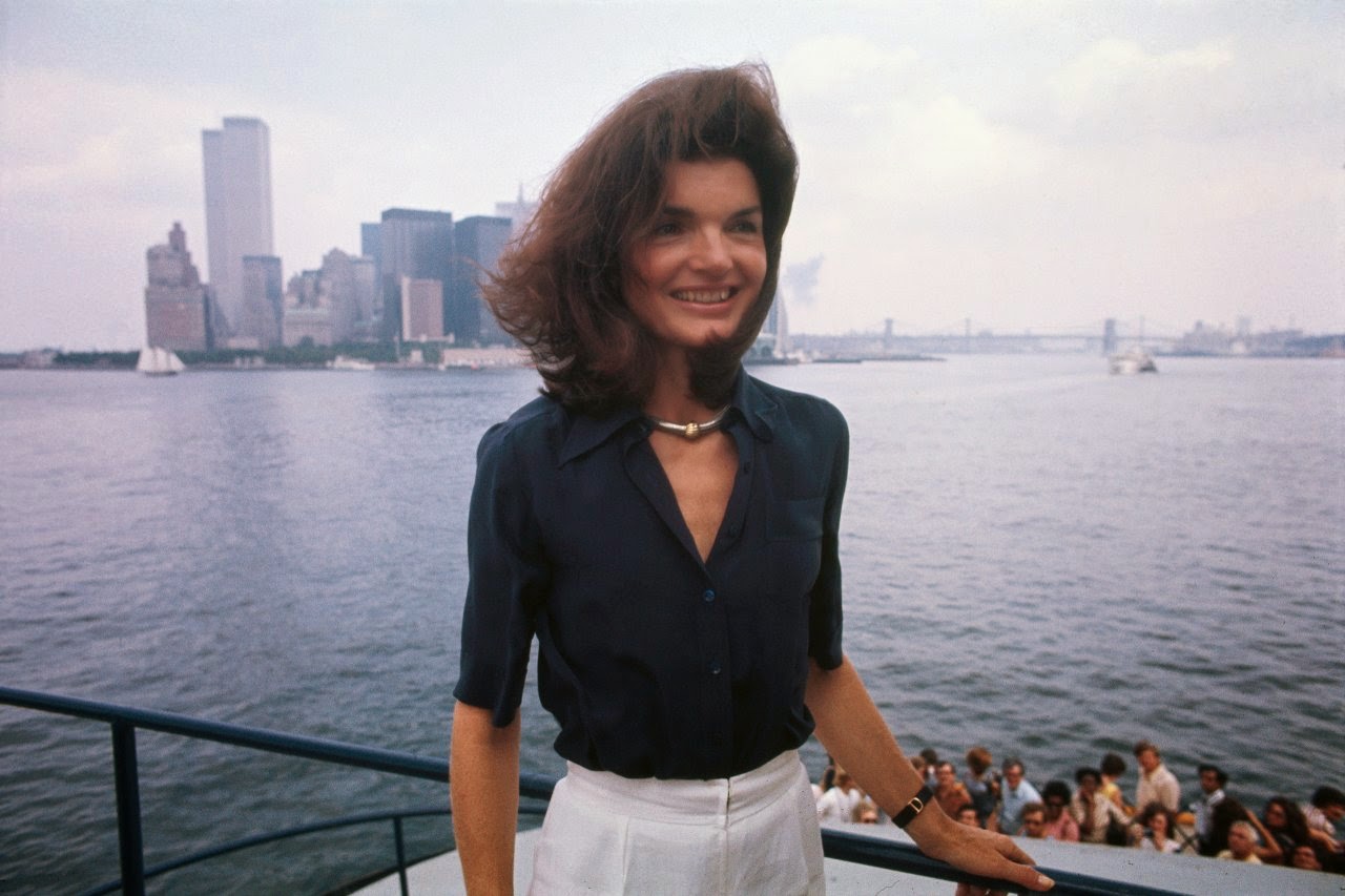 Mrs. Onassis is seen abord the Staten Island Ferry in the New York harbor, returning to Manhattan after touring the Snug Harbor Cultural Center, 1976.