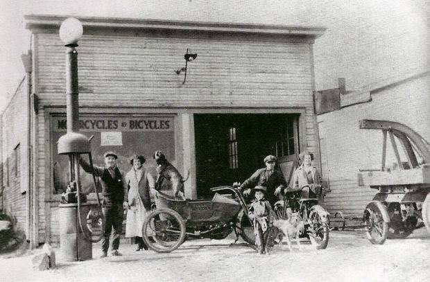 Ernest and Pierina Tramontin with a dog in a sidecar at the Lexington Cycle Shop in Clifton, New Jersey, 1924