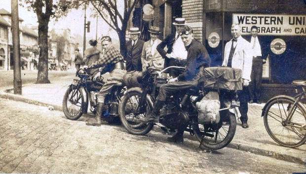 Earl Heyer and a friend at the corner of Bloomfield and Glen Ridge avenues in Montclair, New Jersey, before a cross-country motorcycle trip, 1924