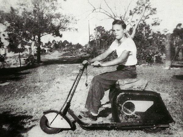Unidentified young man with a scooter in Chatham Township, New Jersey, 1960s