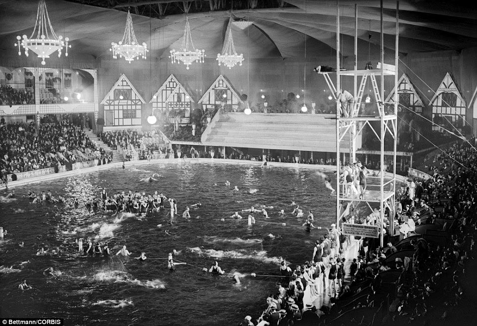 Madison Square Garden transformed into swimming pool scene in Tex Rickard's luxurious indoor swimming pool which was thrown open to the public in 1921