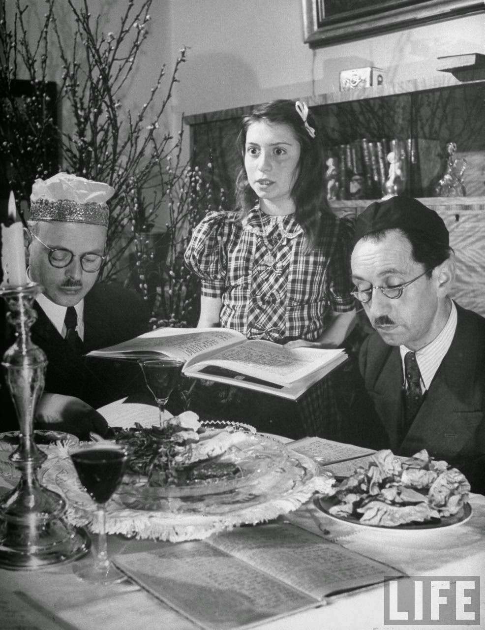 A child asking her elders ritual question during the Passover seder.