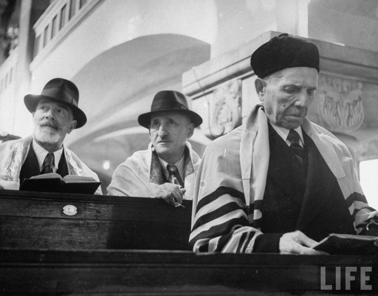 German Jews who survived concentration camps worshipping at the synagogue during Passover.