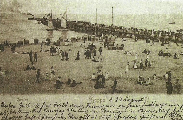 View of part of the beach and pier, 1903.