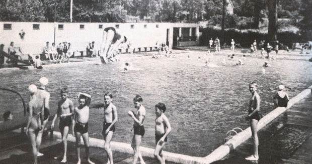 A diver in mid-air at the Elm Tree Pool and Tennis Club in West Caldwell, 1900s