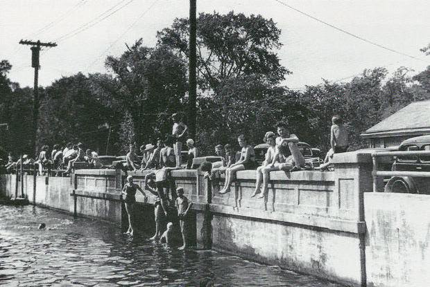 Swimmers and divers on the Woodbury Road Bridge in Blackwood, 1940