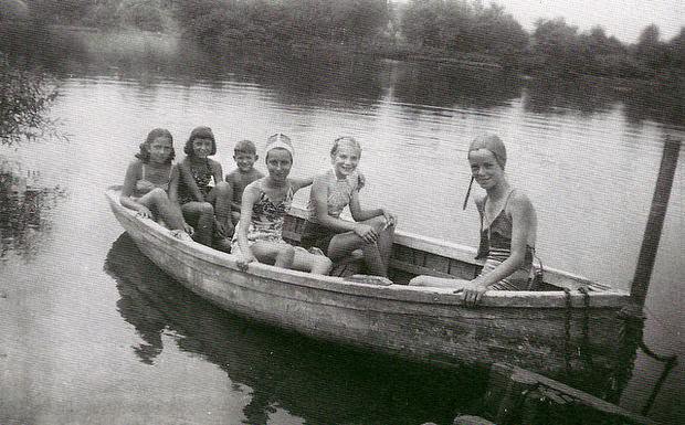 Five young ladies and one young man at the dock on Farrington Lake in North Brunswick, 1940s