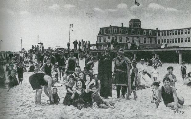 Bathers at the beach at 16th Avenue in front of the Atlantic Hotel in Belmar, 1922