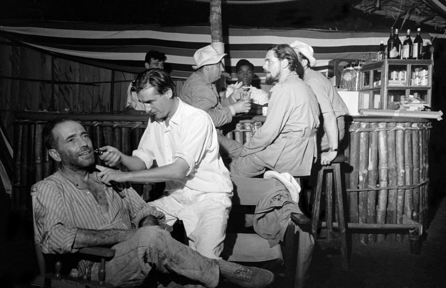 Humphrey Bogart’s beard gets a touch-up during filming of The African Queen.