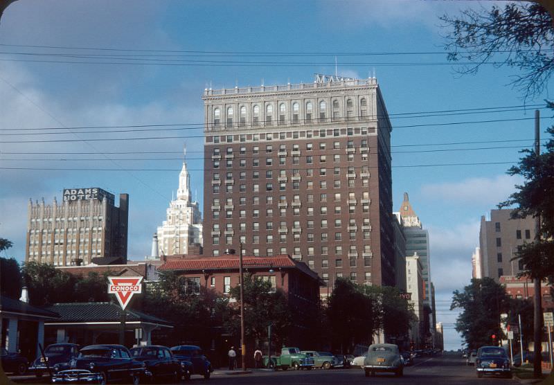 5th street, looking east from about Elwood Ave. Tulsa Central Library is now on the corner in the picture where the Conoco station is, Tulsa, Oklahoma, 1953