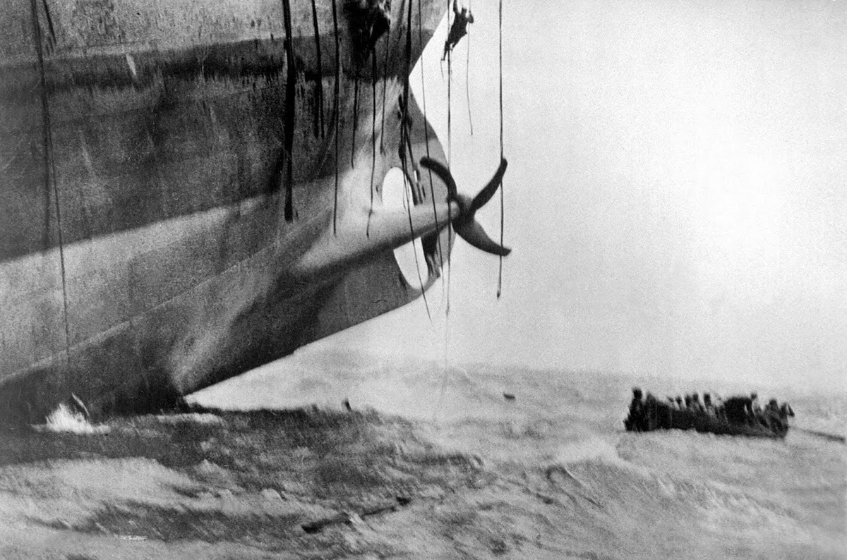 Last minute escape from a vessel torpedoed by a German sub, circa 1917.