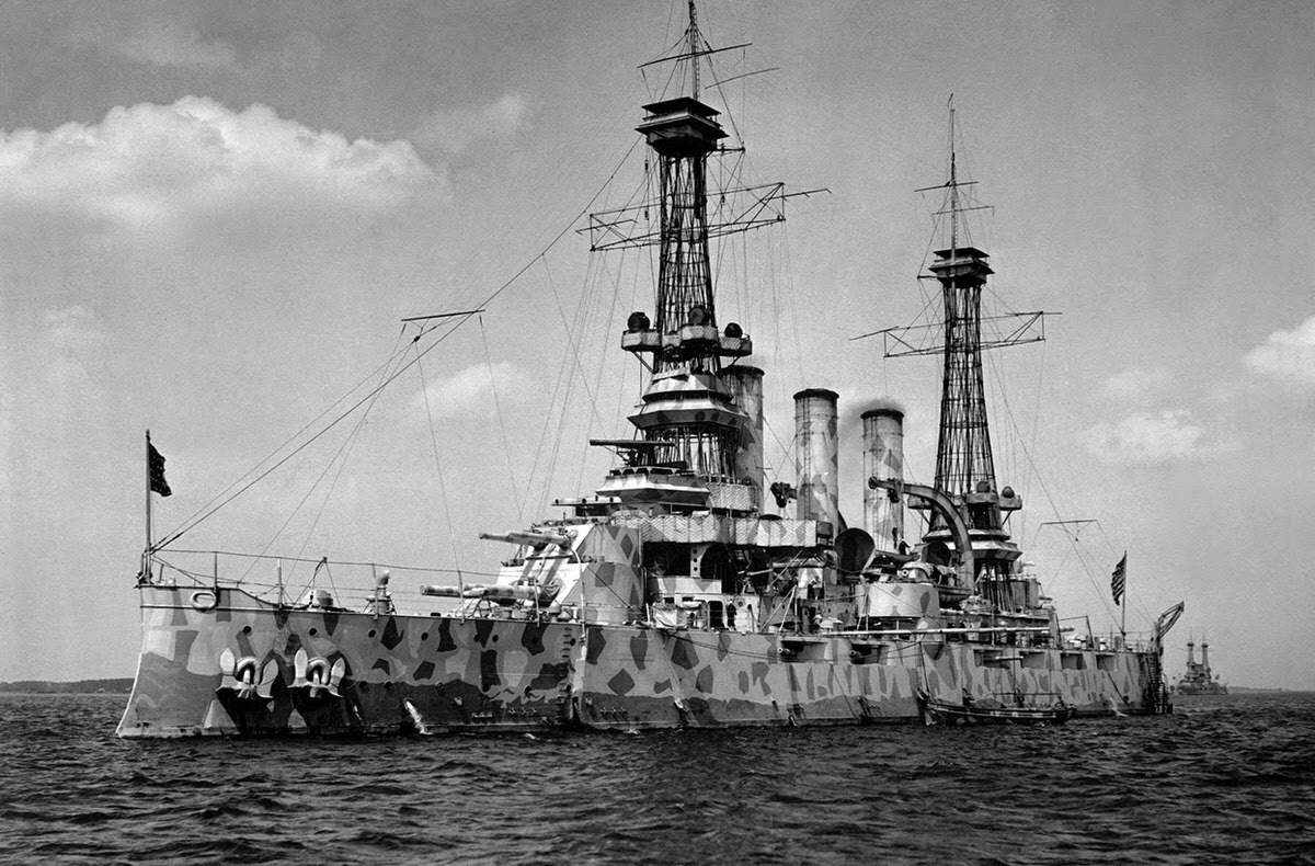 The USS New Jersey (BB-16), a Virginia-class battleship, in camouflage coat, circa 1918.