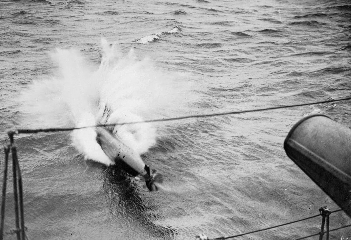 Launching a torpedo, British Royal Navy, 1917.