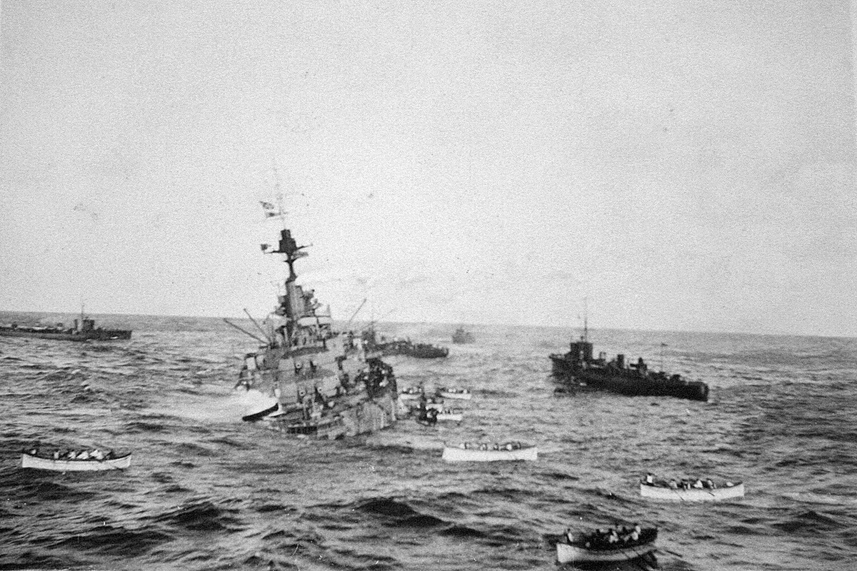 HMS Audacious crew board lifeboats to be taken aboard RMS Olympic, October 1914, after the Audacious was sunk by a German naval mine off the northern coast of Donegal, Ireland.