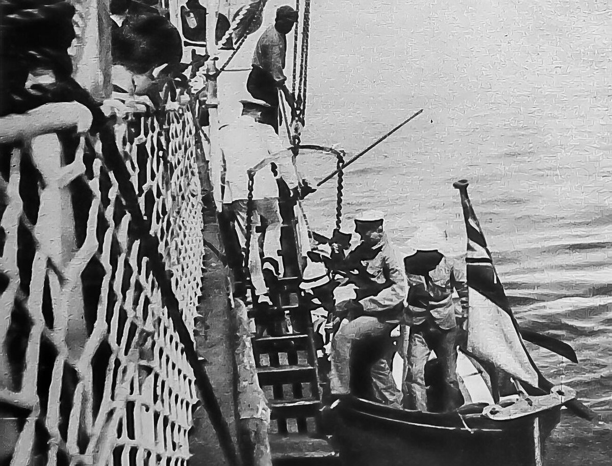 British naval officers board a Greek vessel in the Aegean Sea to examine papers and passengers, 1915.