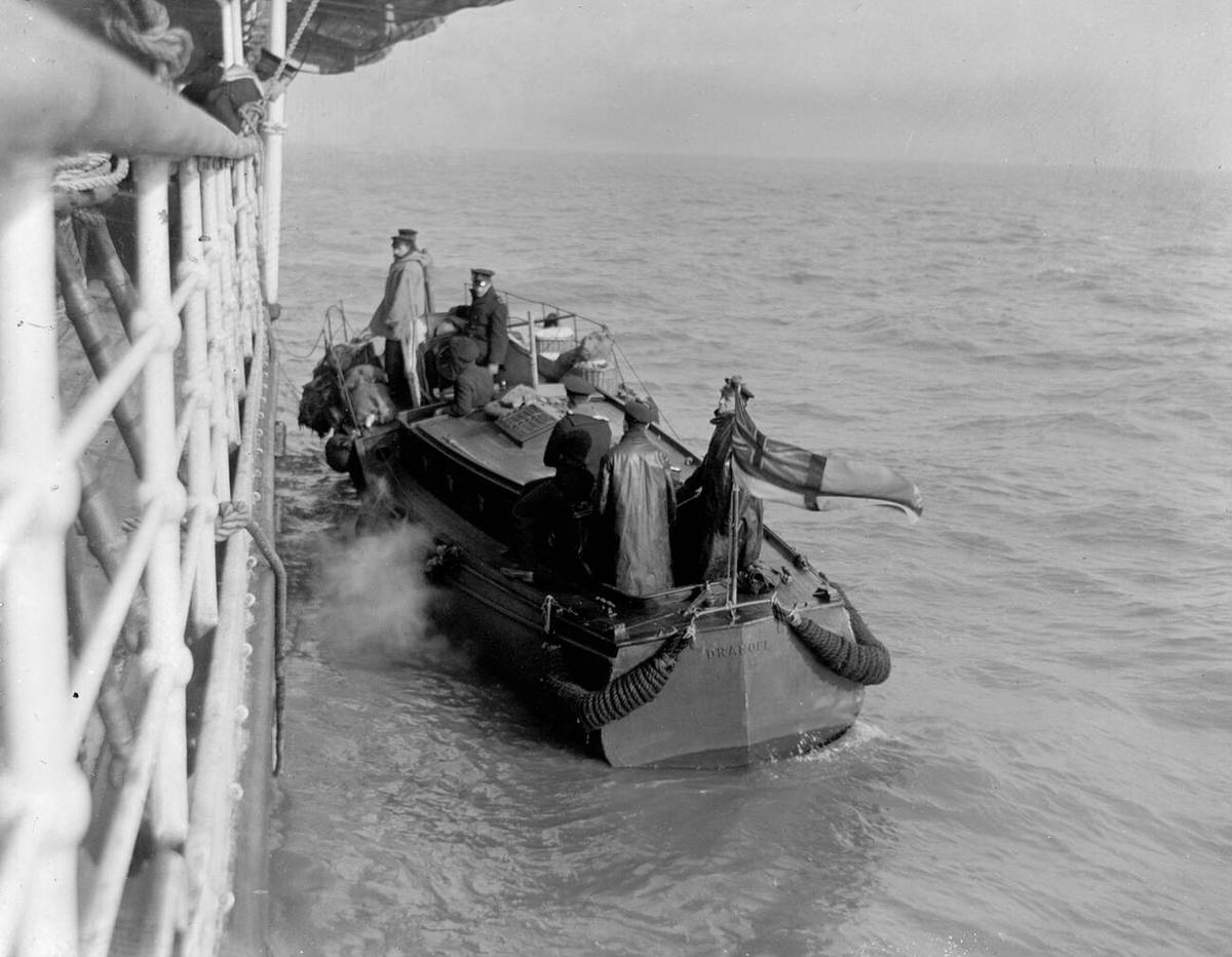 The Royal Naval Mail Boat delivering letters and newspapers to ships at sea, 1914.