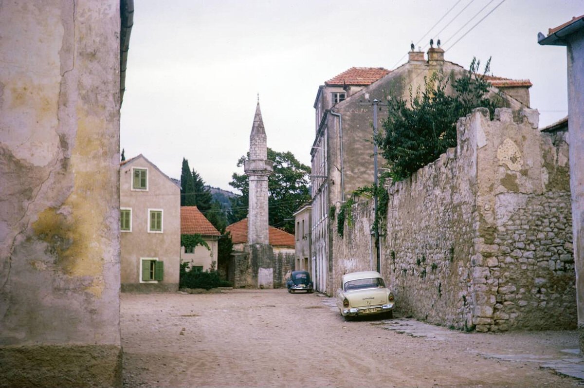 Minaret of mosque of Sultan Ahmed, sandy street of Trebinje, Bosnia and Herzegovina, former Yugoslavia, 1970.