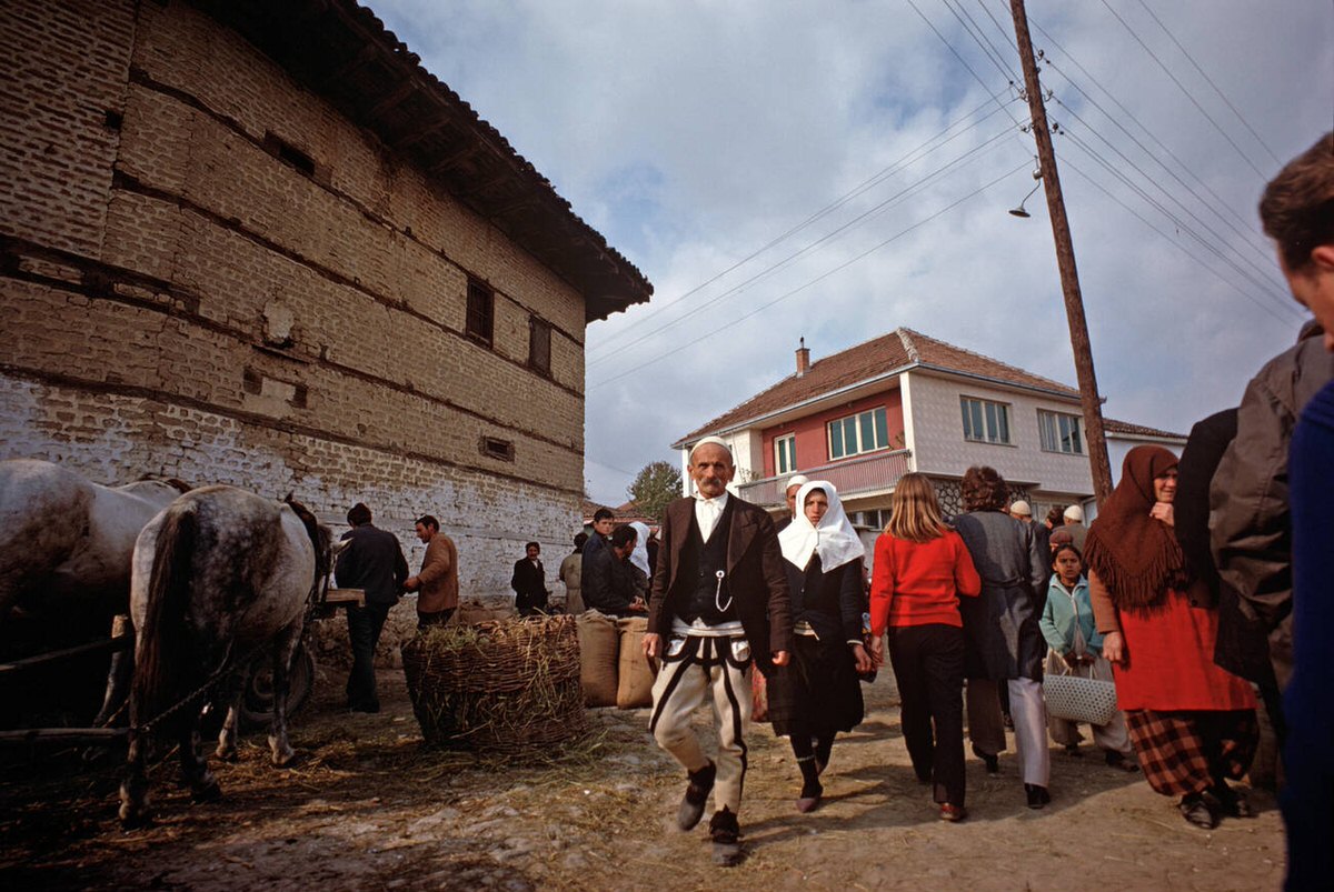 Man and women wearing traditional costume in rural former Yugoslavia, 1971.