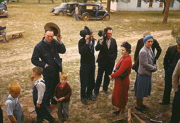 Saying grace before the barbeque dinner at the Pie Town, New Mexico Fair, 1940